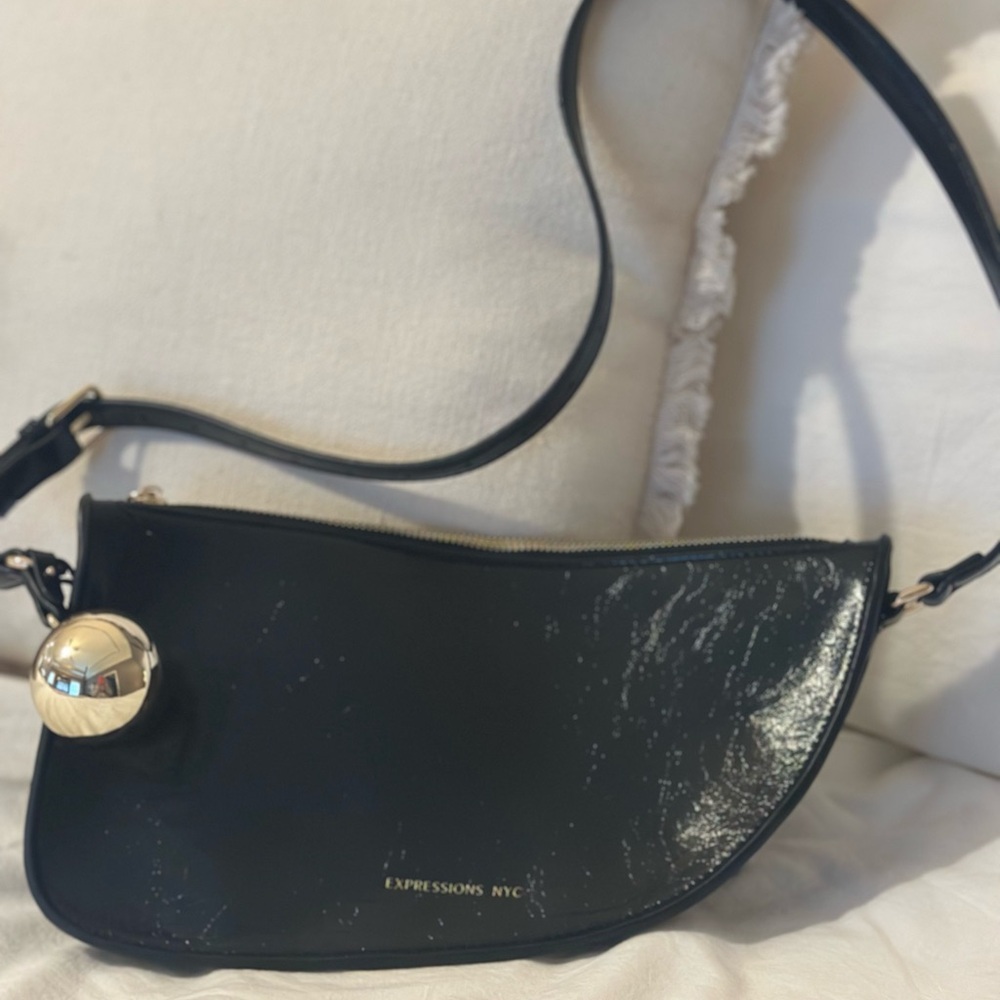Expressions Black Glossy Crossbody Bag with Gold Charm